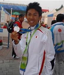 The silver medalist shows off his reward