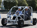 two-seater test EV equipped with the In-wheel Motor