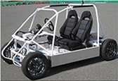 写真：電動コミュータ用インホイールモータシステム搭載試験車両